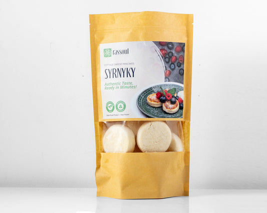 Front of Rassoul Syrnyky 500g packaging – frozen Eastern European cheese pancakes, ready to cook.