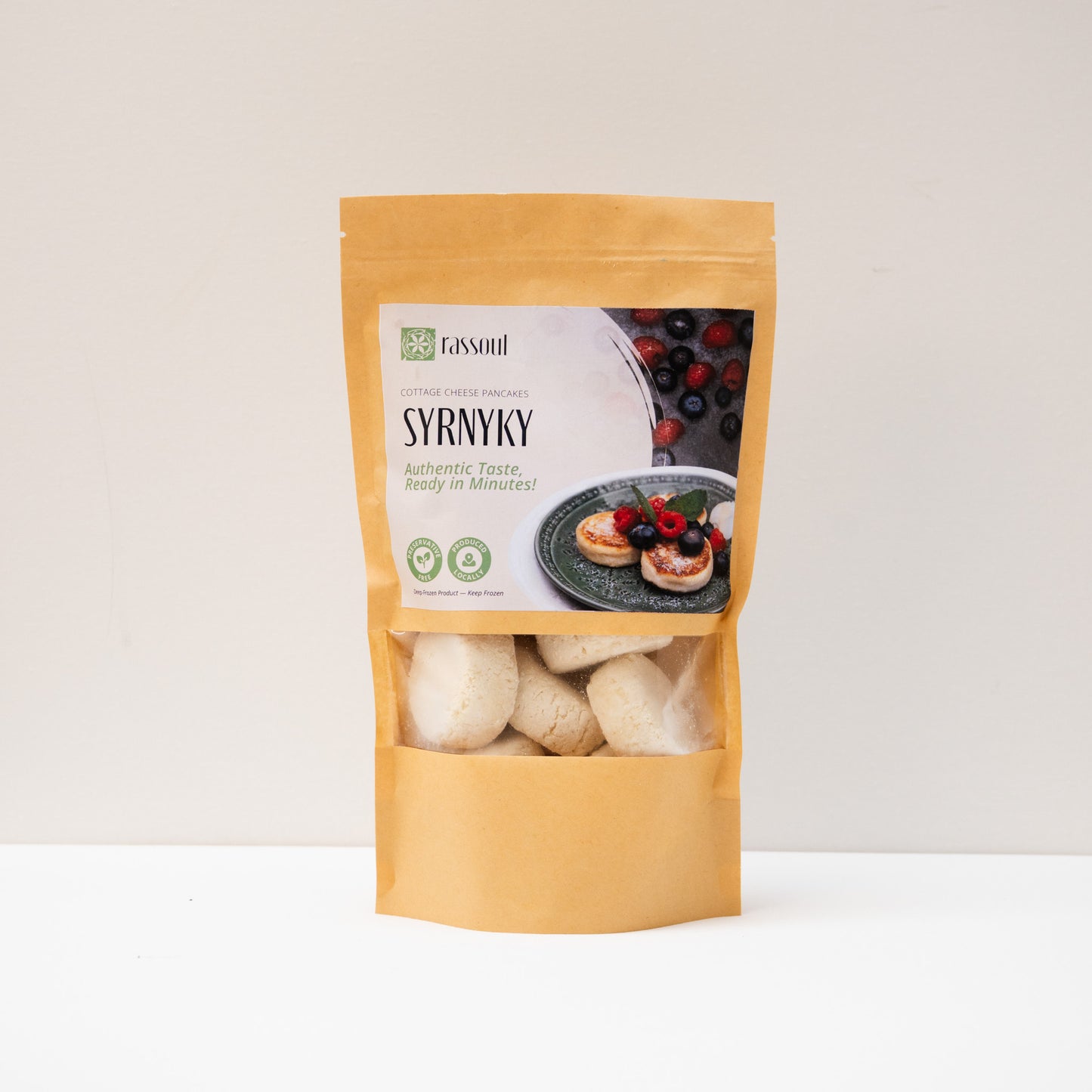 Front of Rassoul Syrnyky 500g packaging – frozen Eastern European cheese pancakes, ready to cook.